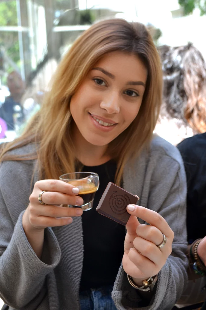 A women having a dark chocolate